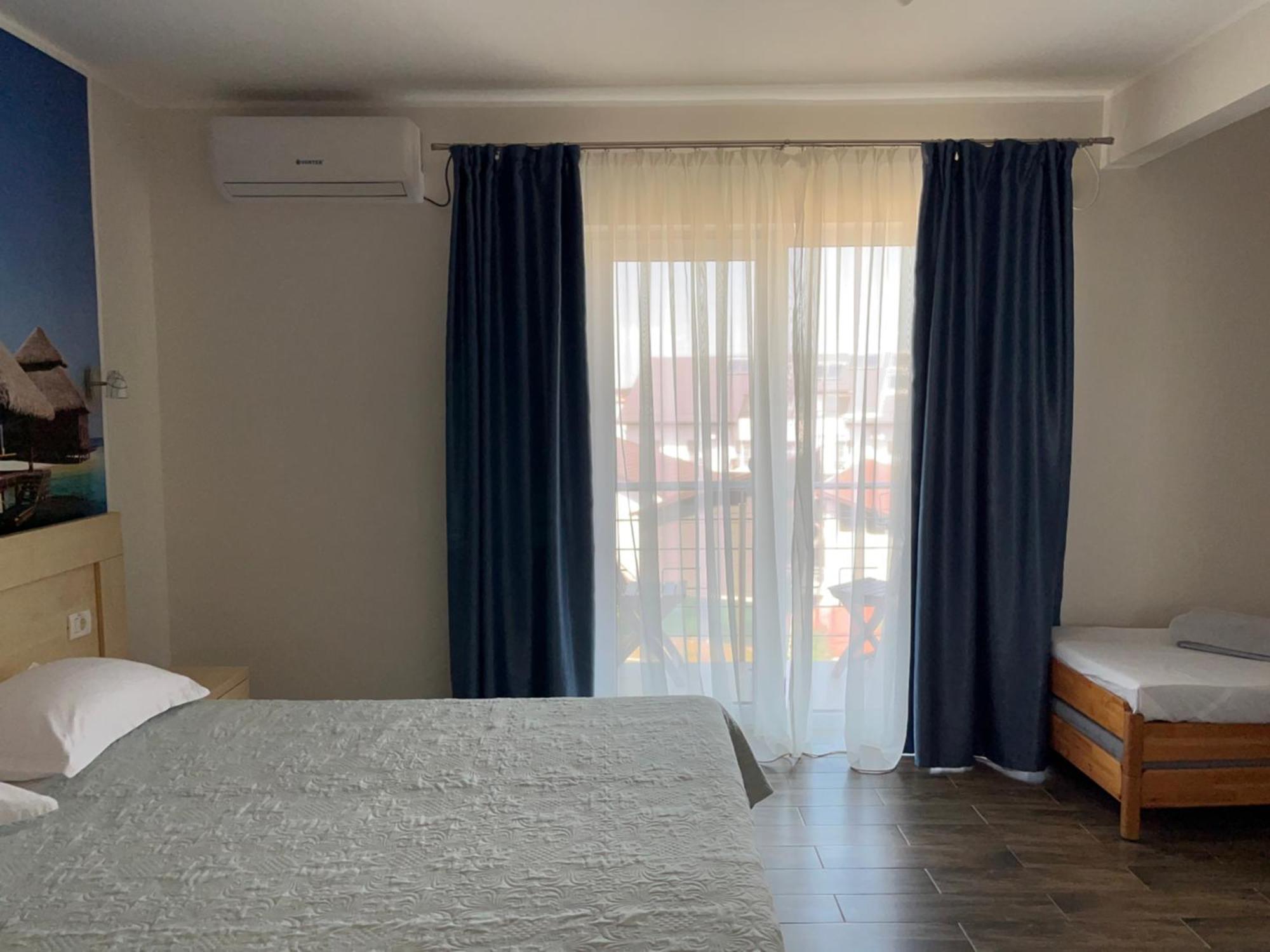 Cameră triplă confort